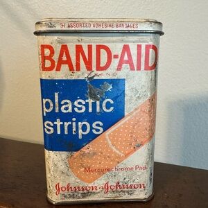 VINTAGE BAND-AID TIN CONTAINER - WITH UNUSED BANDAIDS